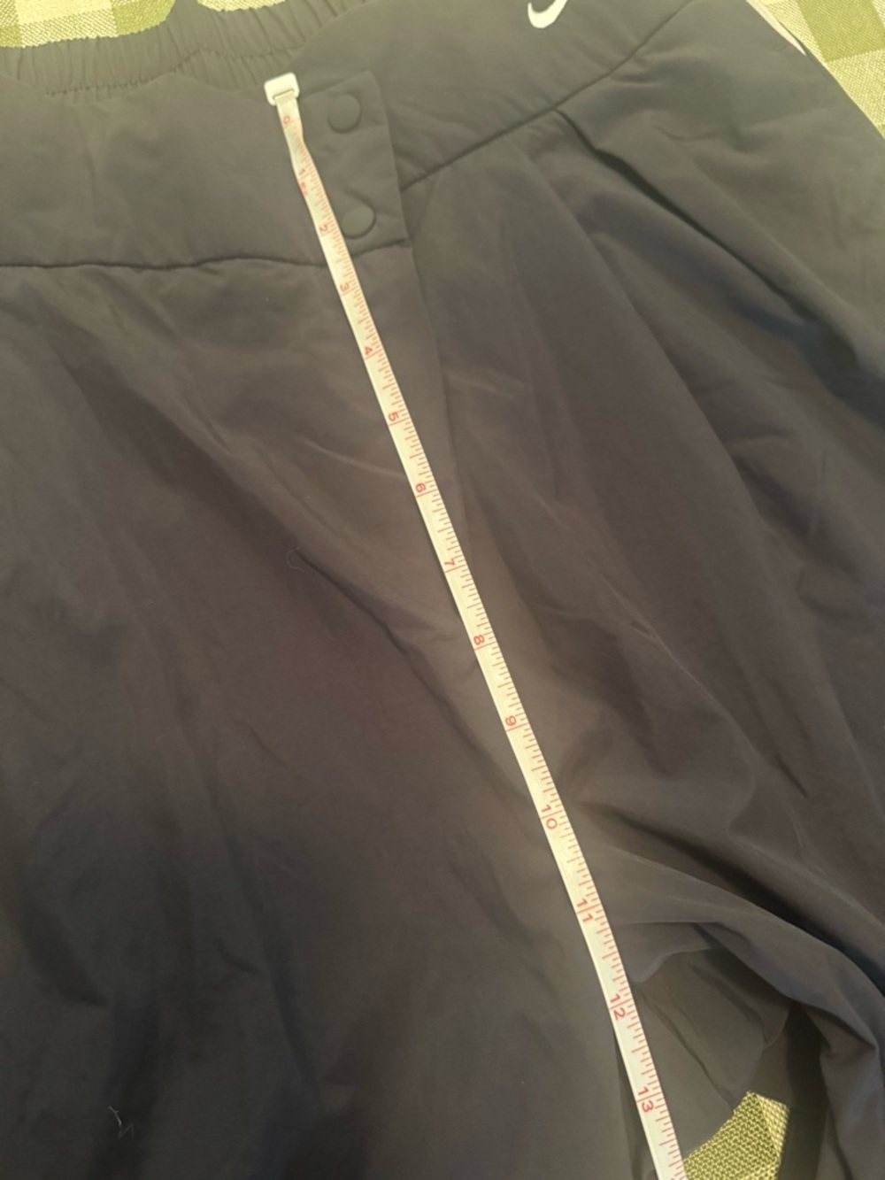 NIKE Asymmetric Waist Water Repellent Pants - Picture 16 of 16